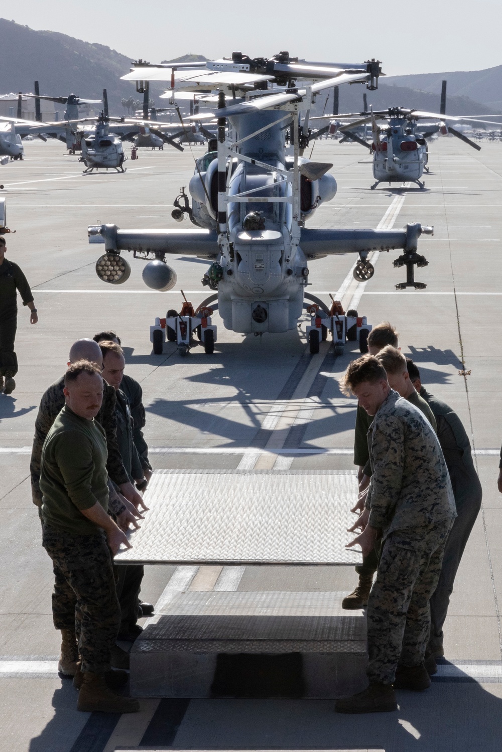 Marine Light Attack and Utility Helicopters Demonstrate Joint Expeditionary Capabilities with Air Force Transport Aircraft