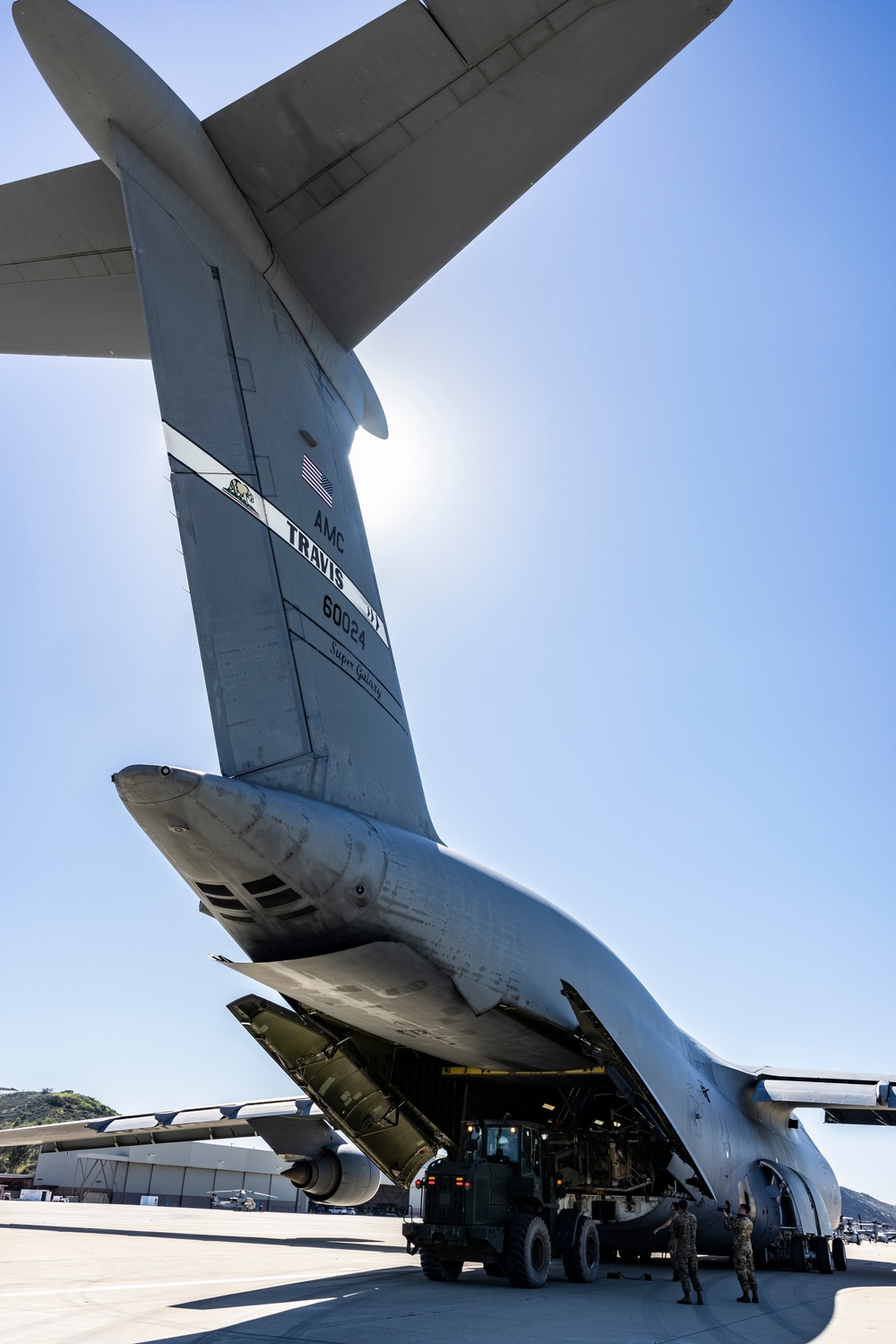 Marine Light Attack and Utility Helicopters Demonstrate Joint Expeditionary Capabilities with Air Force Transport Aircraft