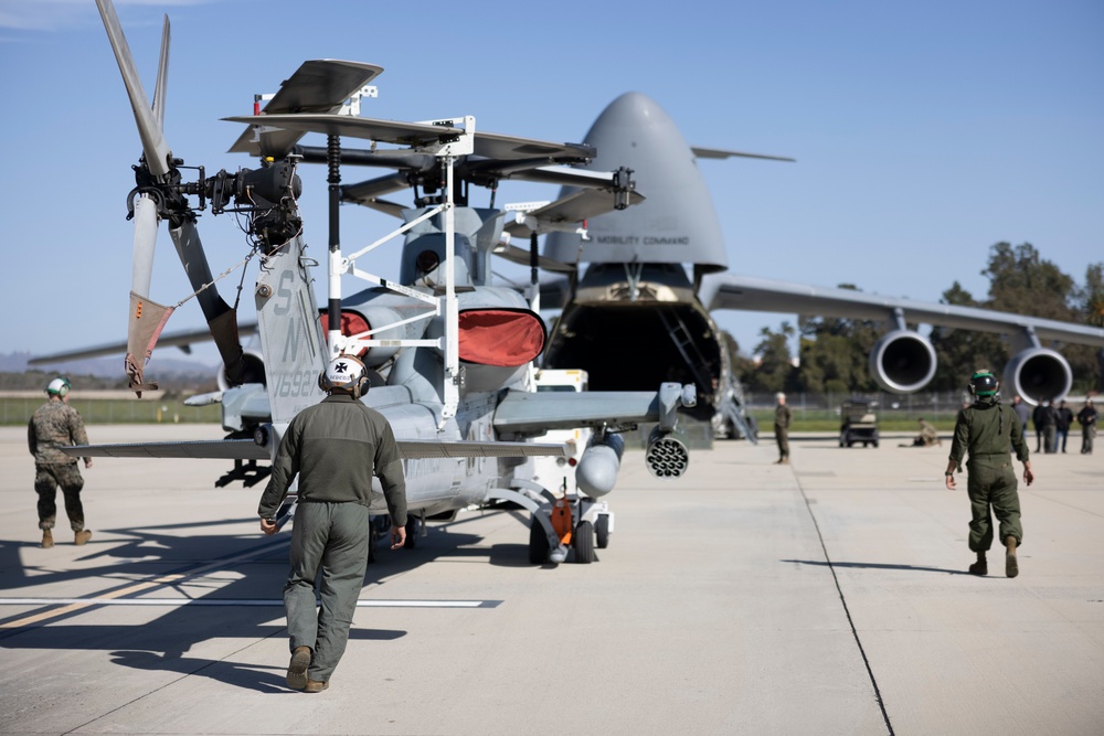 Marine Light Attack and Utility Helicopters Demonstrate Joint Expeditionary Capabilities with Air Force Transport Aircraft