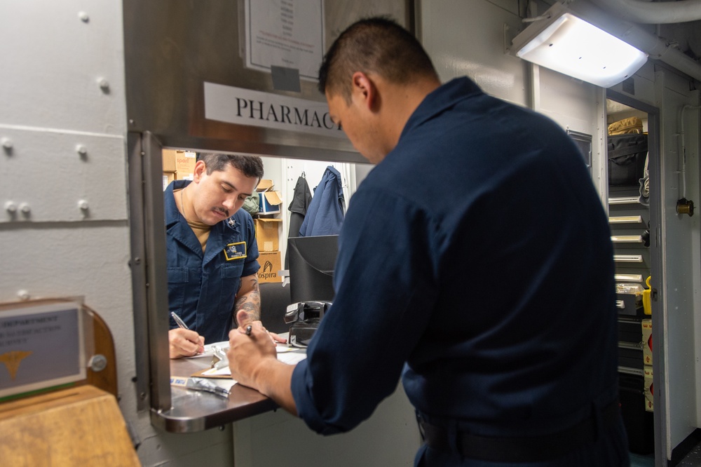 U.S. Navy Sailor Writes Prescription