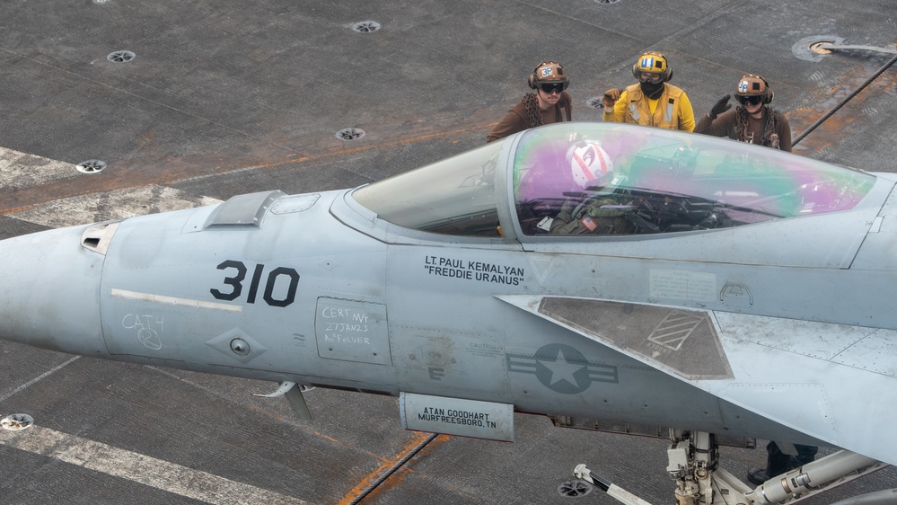 Sailors Communicate With Pilot