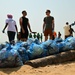 USCGC Spencer (WMEC 905) participates in a joint organization beach clean-up