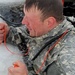 Airmen jump in for cold-water immersion training as part of Air Force-led Cold-Weather Operations Course at Fort McCoy