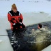 Airmen jump in for cold-water immersion training as part of Air Force-led Cold-Weather Operations Course at Fort McCoy