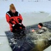 Airmen jump in for cold-water immersion training as part of Air Force-led Cold-Weather Operations Course at Fort McCoy