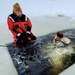 Airmen jump in for cold-water immersion training as part of Air Force-led Cold-Weather Operations Course at Fort McCoy