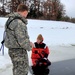 Airmen jump in for cold-water immersion training as part of Air Force-led Cold-Weather Operations Course at Fort McCoy