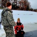 Airmen jump in for cold-water immersion training as part of Air Force-led Cold-Weather Operations Course at Fort McCoy