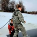 Airmen jump in for cold-water immersion training as part of Air Force-led Cold-Weather Operations Course at Fort McCoy