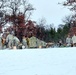 Airmen learn to build Arctic 10-person tents during cold-weather training at Fort McCoy