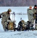 Airmen learn to build Arctic 10-person tents during cold-weather training at Fort McCoy