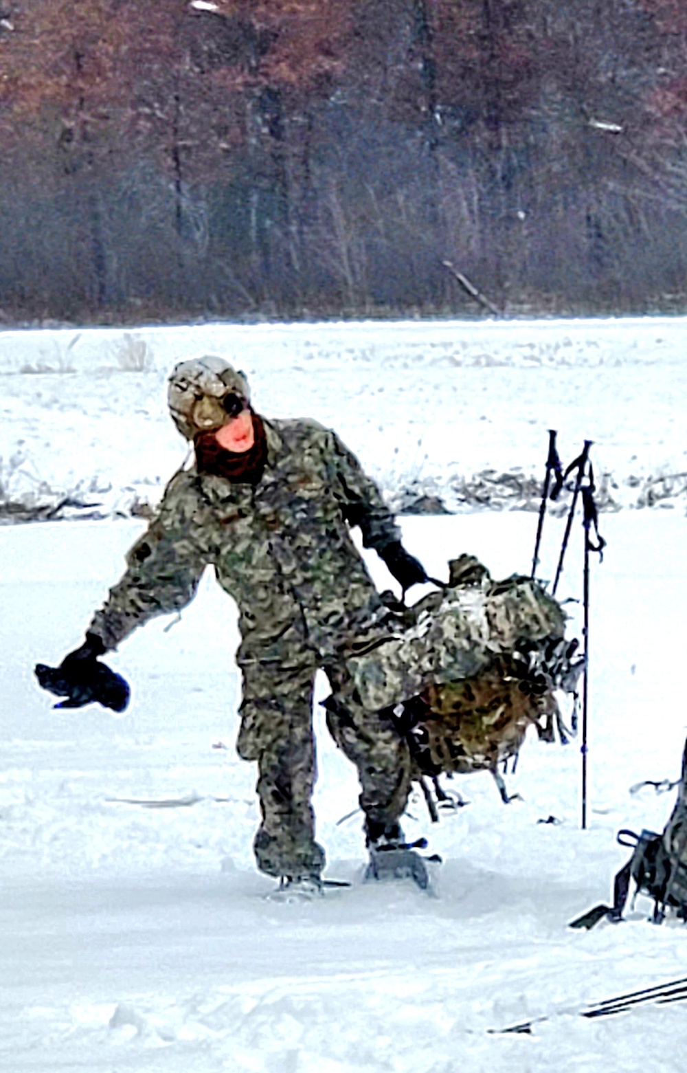 Airmen learn to build Arctic 10-person tents during cold-weather training at Fort McCoy