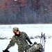 Airmen learn to build Arctic 10-person tents during cold-weather training at Fort McCoy