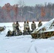 Airmen learn to build Arctic 10-person tents during cold-weather training at Fort McCoy