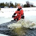 Airmen jump in for cold-water immersion training as part of Air Force-led Cold-Weather Operations Course at Fort McCoy