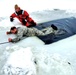 Airmen jump in for cold-water immersion training as part of Air Force-led Cold-Weather Operations Course at Fort McCoy