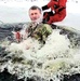 Airmen jump in for cold-water immersion training as part of Air Force-led Cold-Weather Operations Course at Fort McCoy