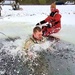 Airmen jump in for cold-water immersion training as part of Air Force-led Cold-Weather Operations Course at Fort McCoy