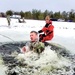 Airmen jump in for cold-water immersion training as part of Air Force-led Cold-Weather Operations Course at Fort McCoy