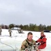 Airmen jump in for cold-water immersion training as part of Air Force-led Cold-Weather Operations Course at Fort McCoy