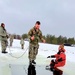 Airmen jump in for cold-water immersion training as part of Air Force-led Cold-Weather Operations Course at Fort McCoy