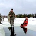 Airmen jump in for cold-water immersion training as part of Air Force-led Cold-Weather Operations Course at Fort McCoy