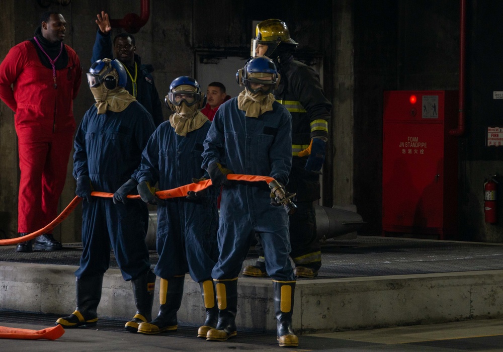 U.S. Navy Sailors participate in firefighting training