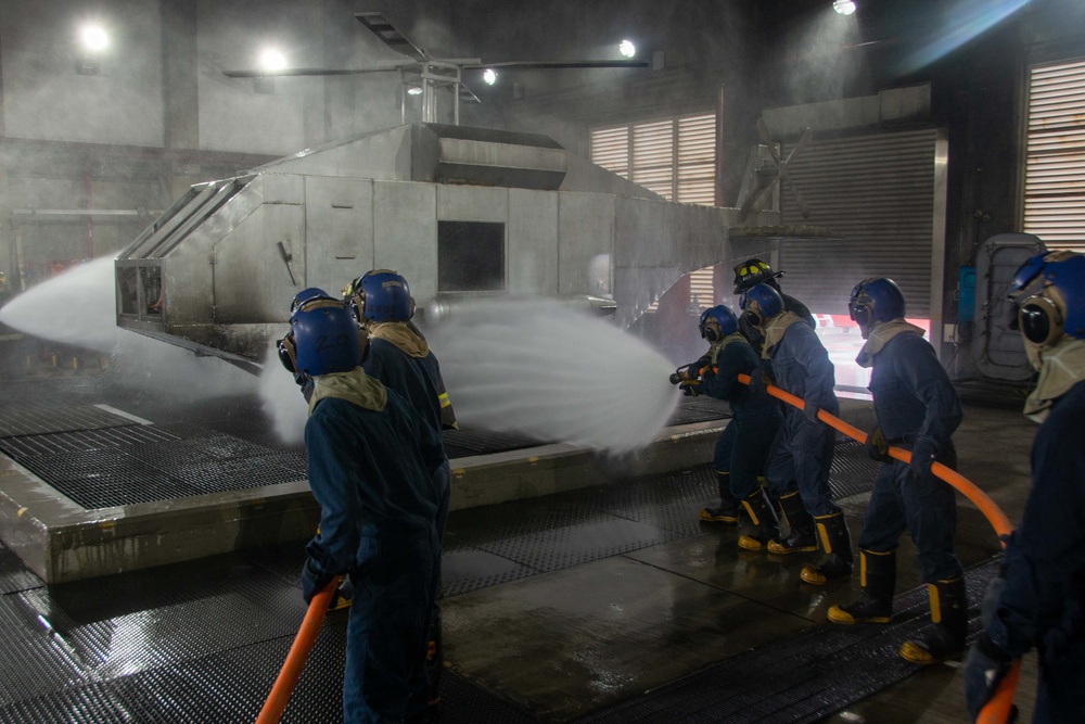 U.S. Navy Sailors participate in firefighting training