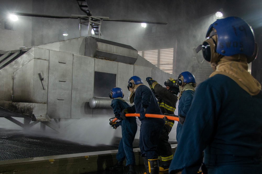 U.S. Navy Sailors participate in firefighting training