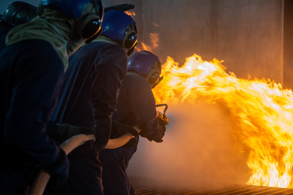 U.S. Navy Sailors participate in firefighting training