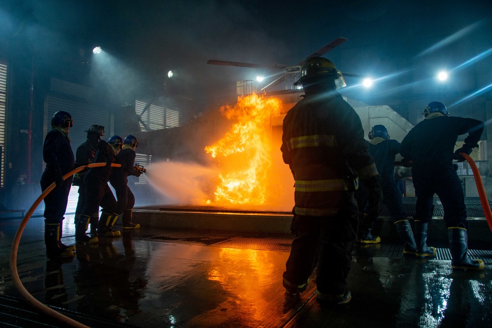 U.S. Navy Sailors participate in firefighting training