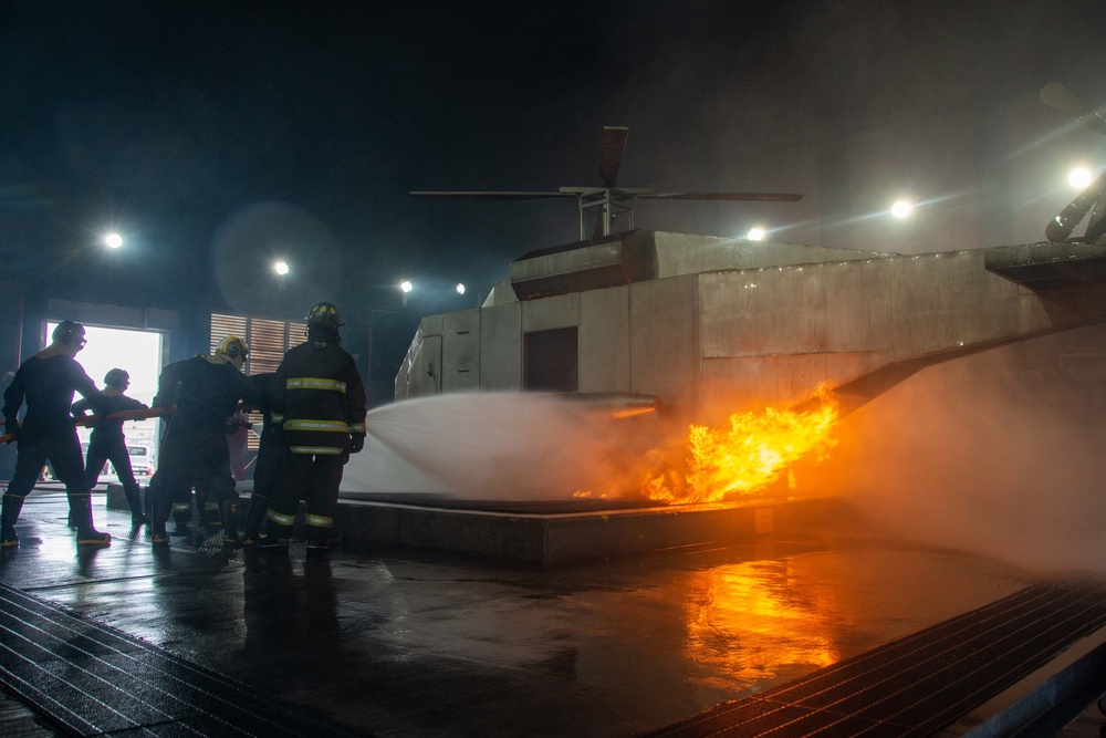 U.S. Navy Sailors participate in firefighting training