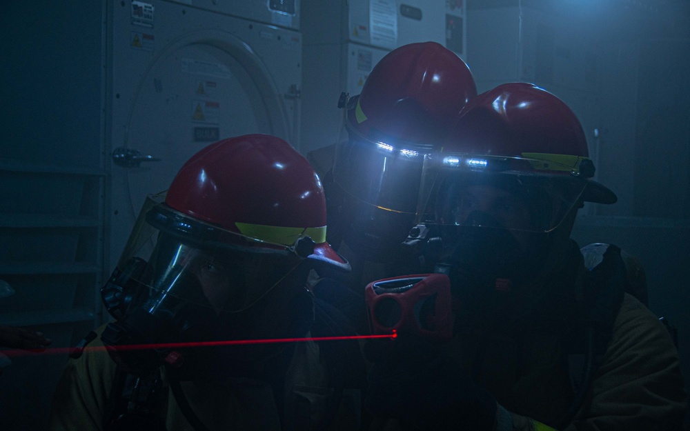 USS Ronald Reagan (CVN 76) conducts a joint damage control drill