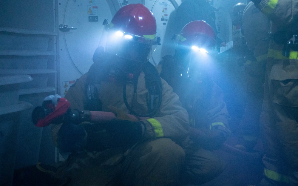 USS Ronald Reagan (CVN 76) conducts a joint damage control drill