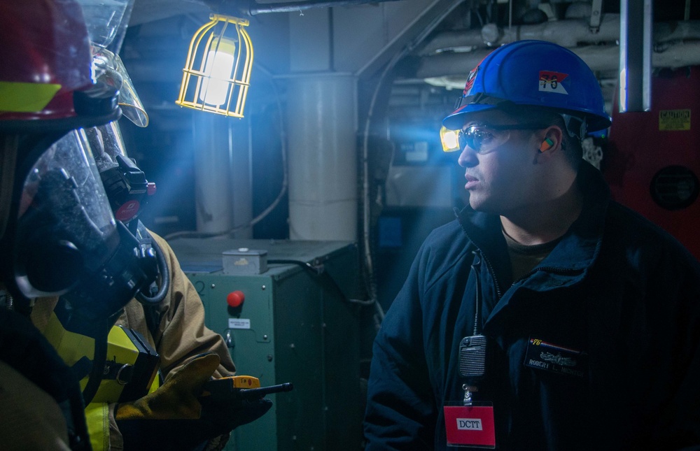 USS Ronald Reagan (CVN 76) conducts a joint damage control drill