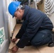 USS Ronald Reagan (CVN 76) Sailors perform preparation for painting