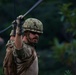 Equipment Operator 3rd Class Nickolas Spicuzza crosses 2 strand bridge.