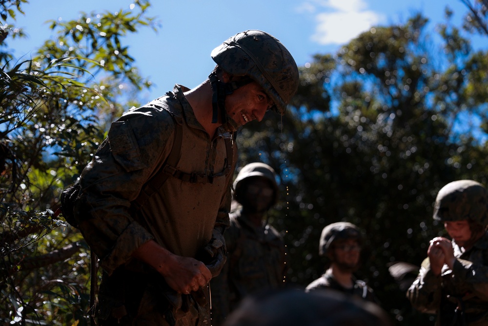 Naval Mobile Construction Battalion (NMCB) 4 Seabees with Marines assigned to 3rd Marine Division, attend joint training at U.S. Marine Corps Camp Gonsalves Jungle Warfare Training Center Okinawa, Japan.