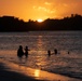 Residents and travelers visit the beaches of Guam