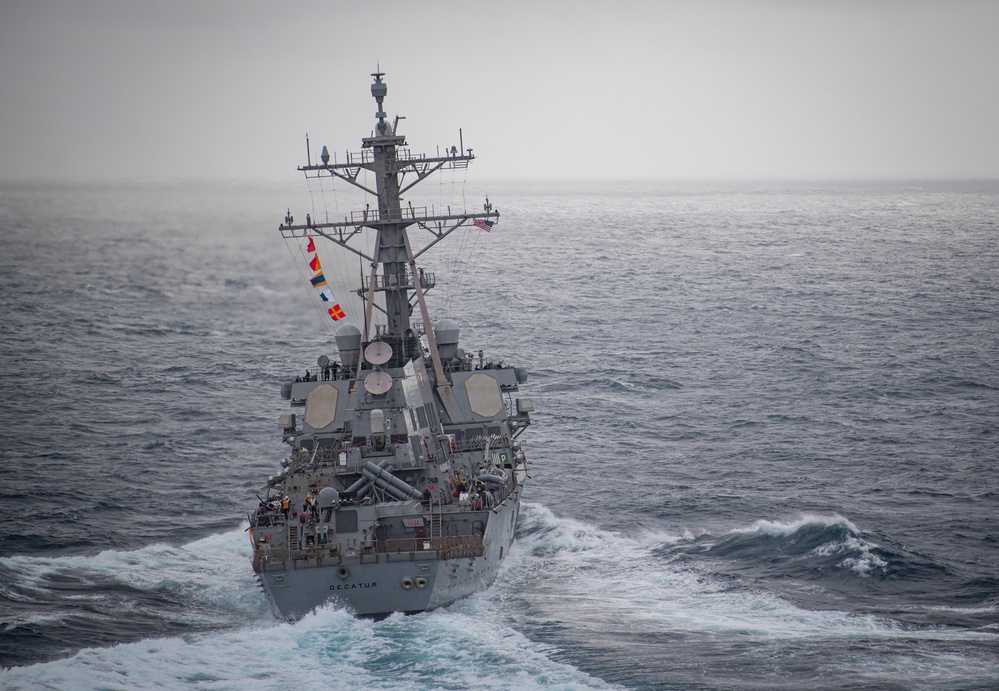 The USS Decatur Steams Near The USS Nimitz