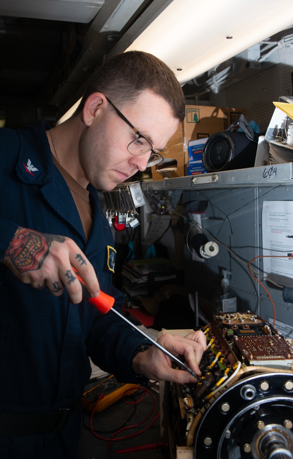 Nimitz Sailors Conduct Maintenance