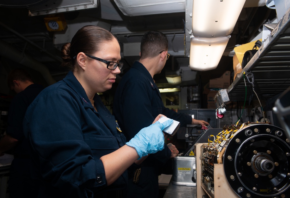 Nimitz Sailors Conduct Maintenance