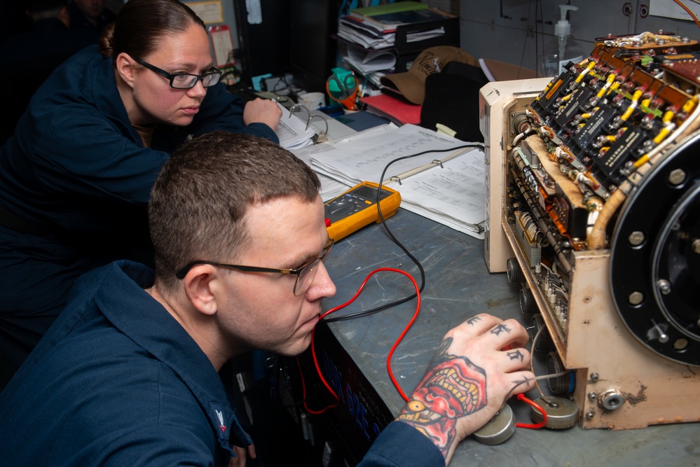 Nimitz Sailors Conduct Maintenance