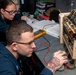 Nimitz Sailors Conduct Maintenance