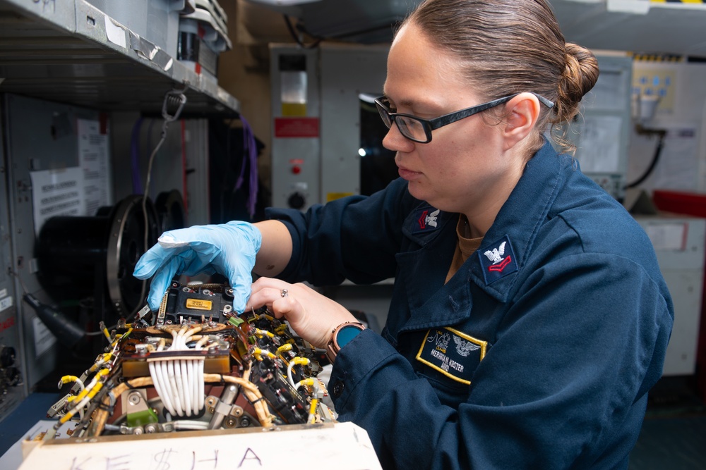 Nimitz Sailors Conduct Maintenance