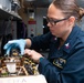 Nimitz Sailors Conduct Maintenance