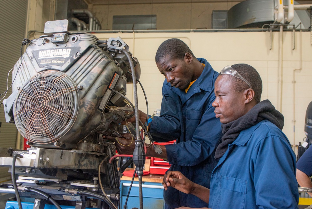 NAVSCIATTS Students Dissect Outboard Motor Engines