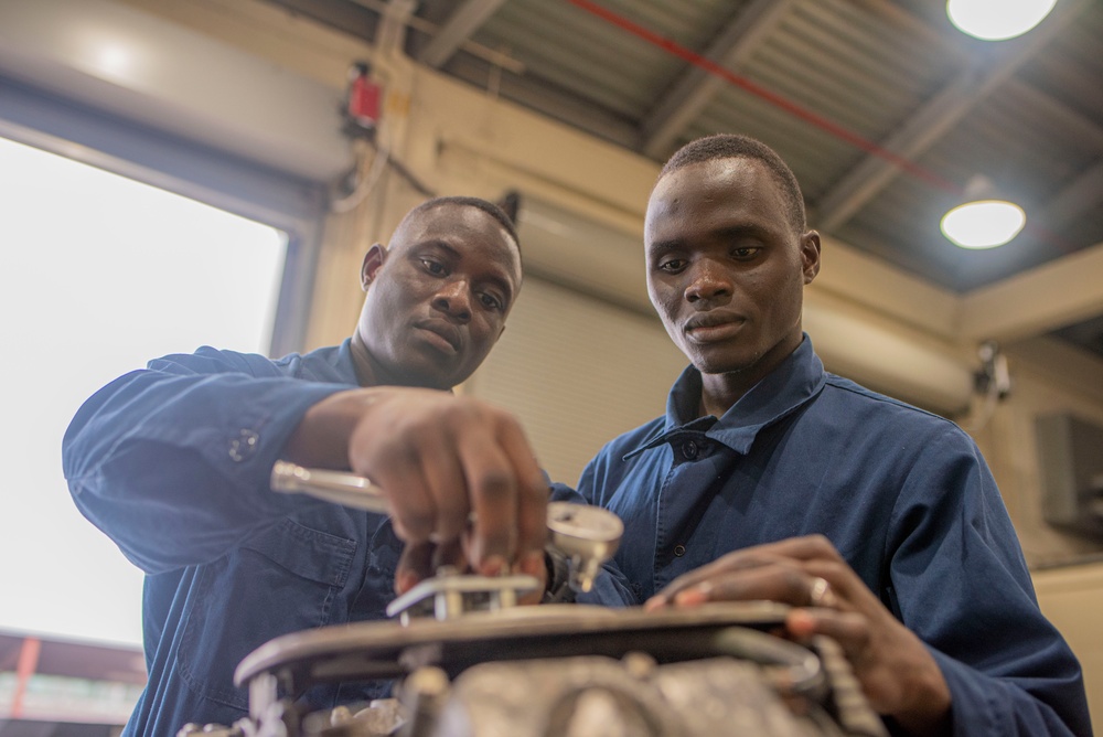 NAVSCIATTS Students Dissect Outboard Motor Engines