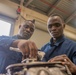 NAVSCIATTS Students Dissect Outboard Motor Engines
