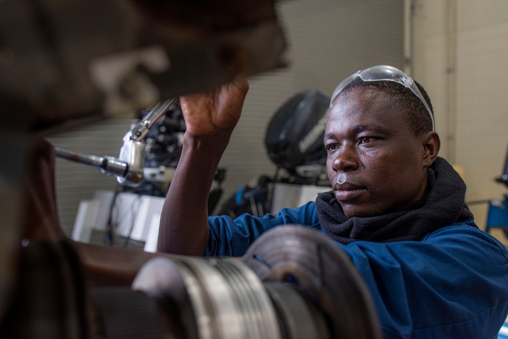 NAVSCIATTS Students Dissect Outboard Motor Engines